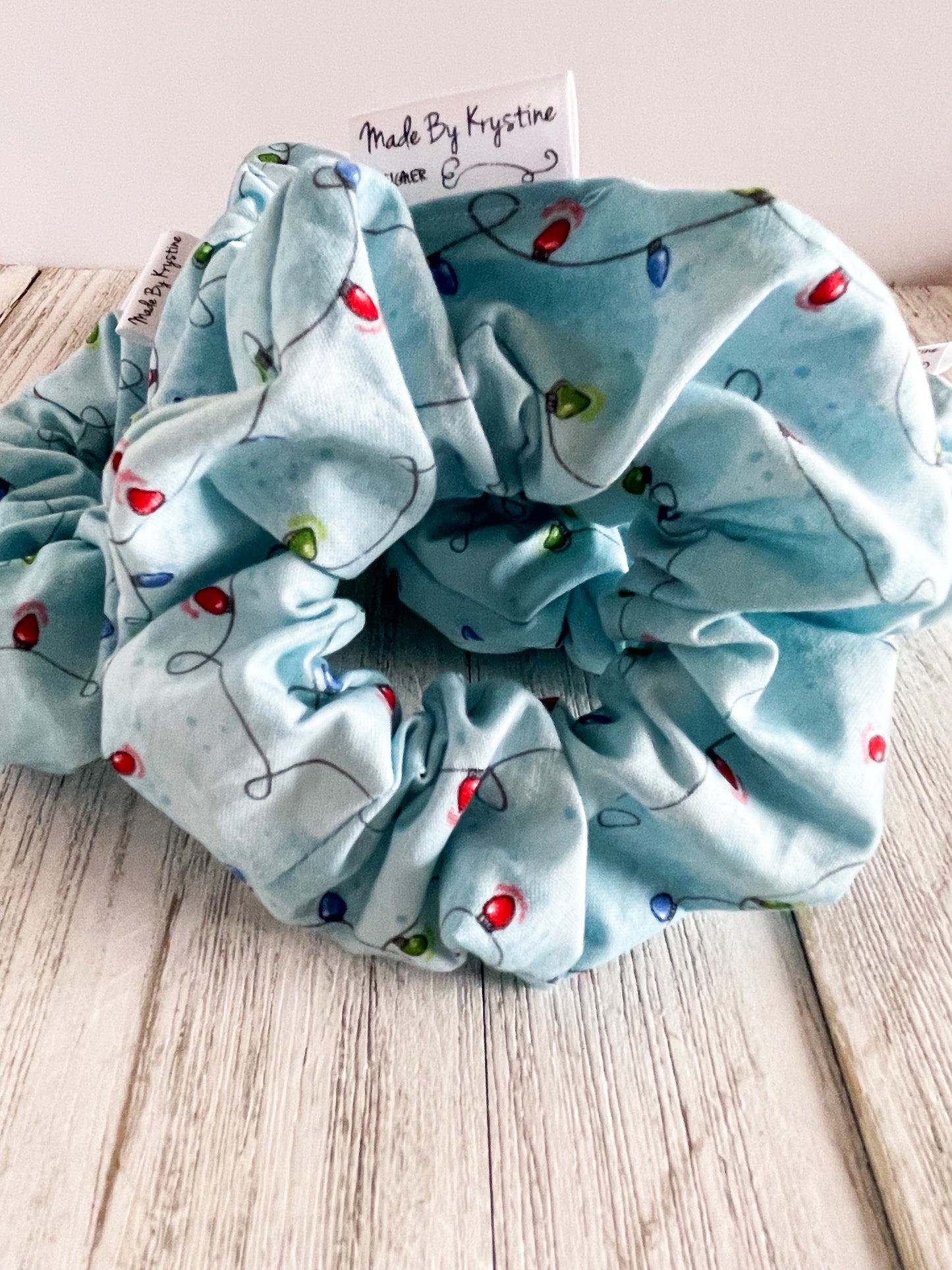 Multicoloured Lights on a Light Blue Background